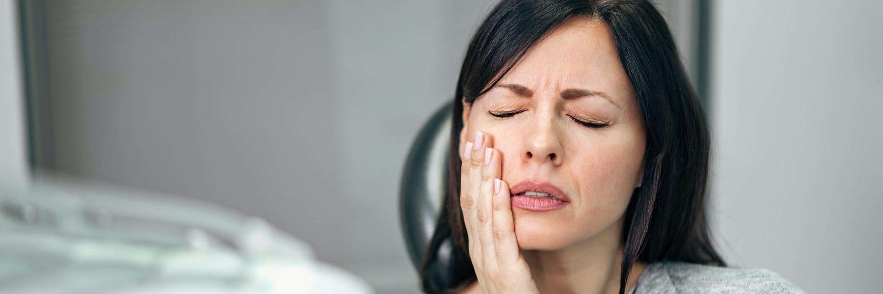 woman in dental clinic for root canal in Seymour